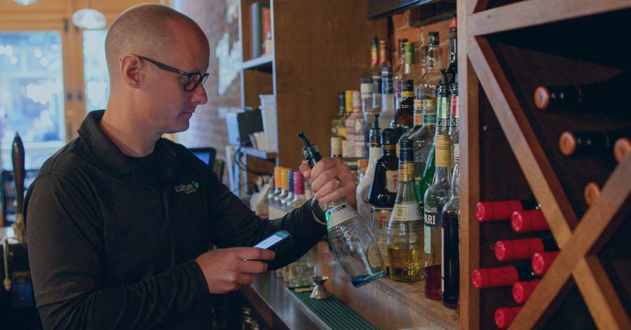 Sculpture Franchisee Taking Liquor Inventory